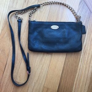 Black coach crossbody bag.